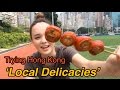 Trying hong kong local delicacies pigs colon century egg  asha etc