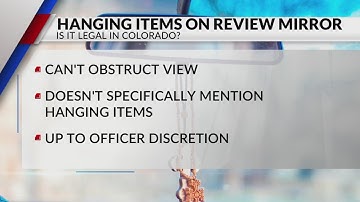 Is it illegal to hang items from your rearview mirror in Colorado?