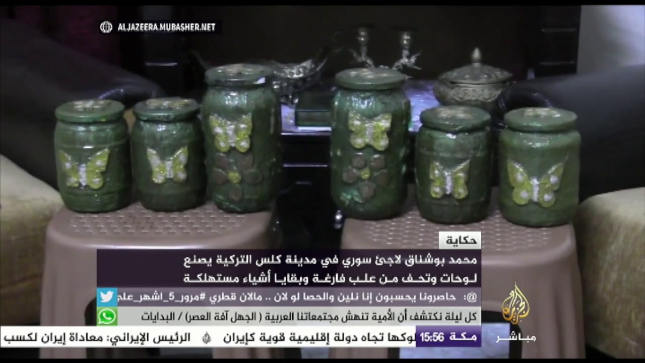 لاجئ سوري في كلس يصنع لوحات وتحف من علب فارغة