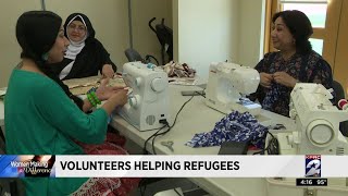 Volunteers helping refugees