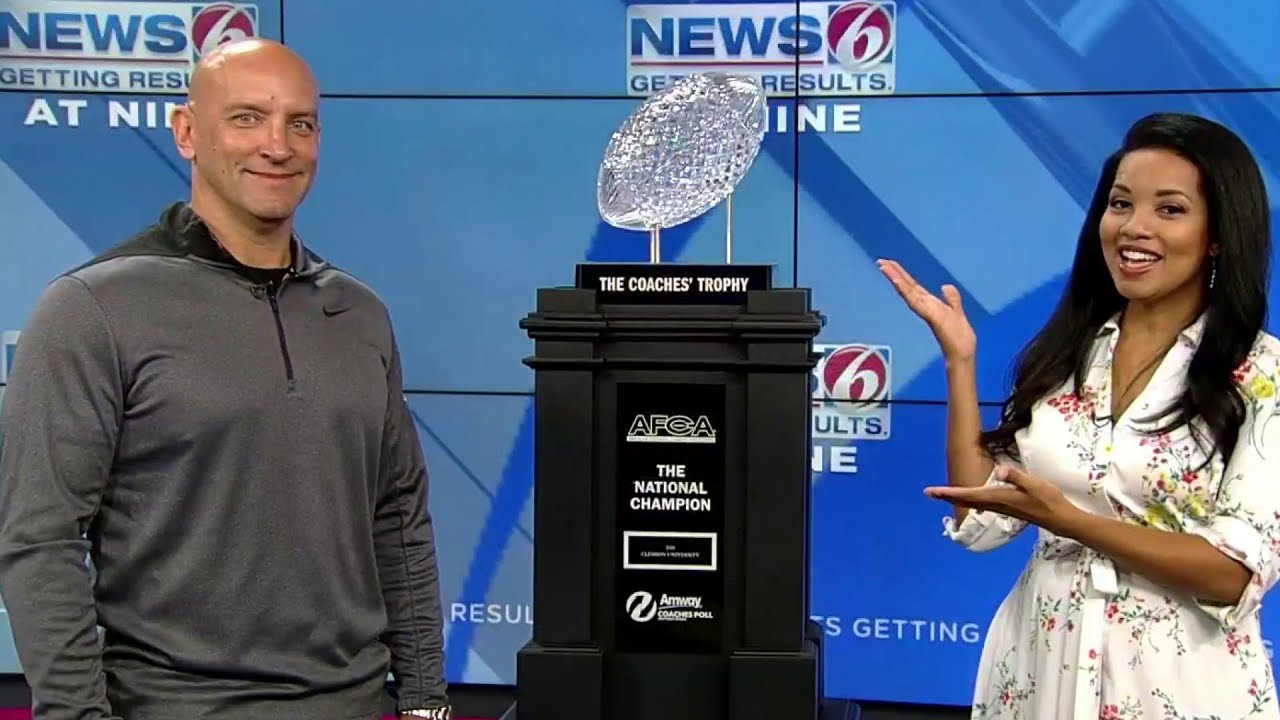 newspaper mockup College football championship trophy on tour