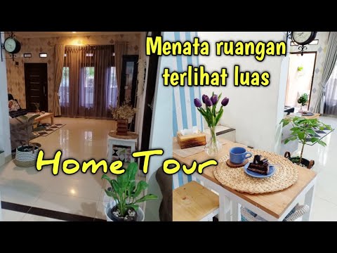 Video: Rumah Berbentuk Persegi Panjang Modern Menawarkan Interior yang Elegan dan Menyenangkan