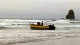 Launching a Pacific Dory in the Surf