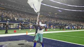 Dez Bryant waving the Dallas Cowboys Flag