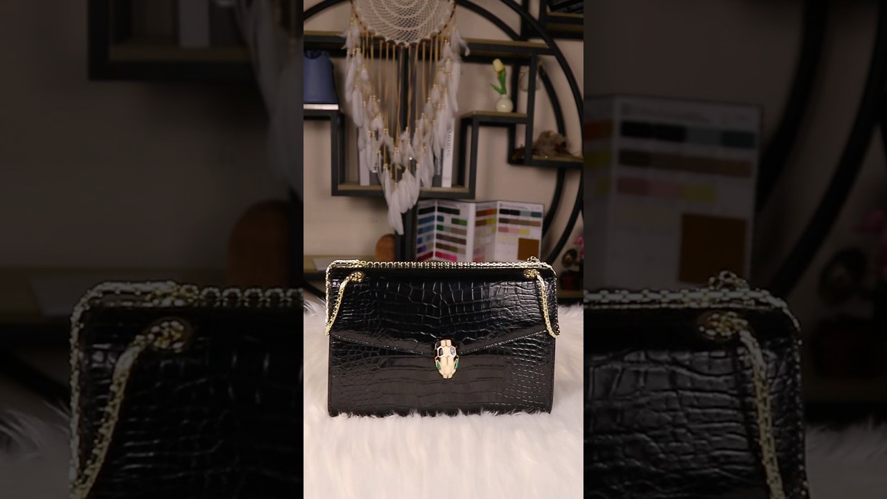 Black crocodile leather handbag