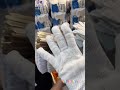 Workers are packing labor protection gloves