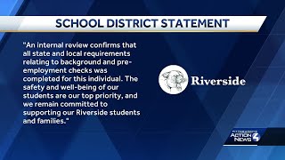 School district issues statement after swim coach charged