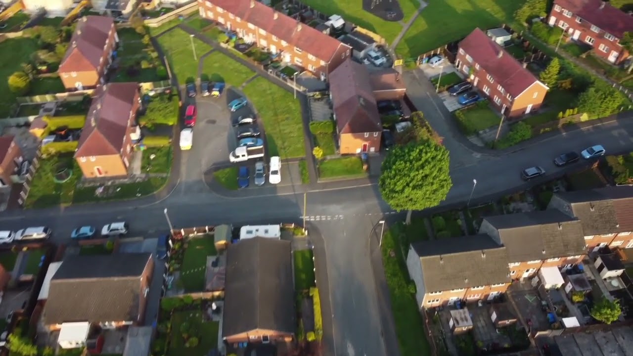 Aerial view of sunrise over Calderbrook, St James Church, and Stansfield. Filmed on DJI mini 2.