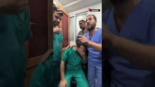 Gazze'li Doktor Görev Yaptığı Hastanede Babası ve Erkek Kardeşinin Cenazesiyle Karşılaştı #shorts
