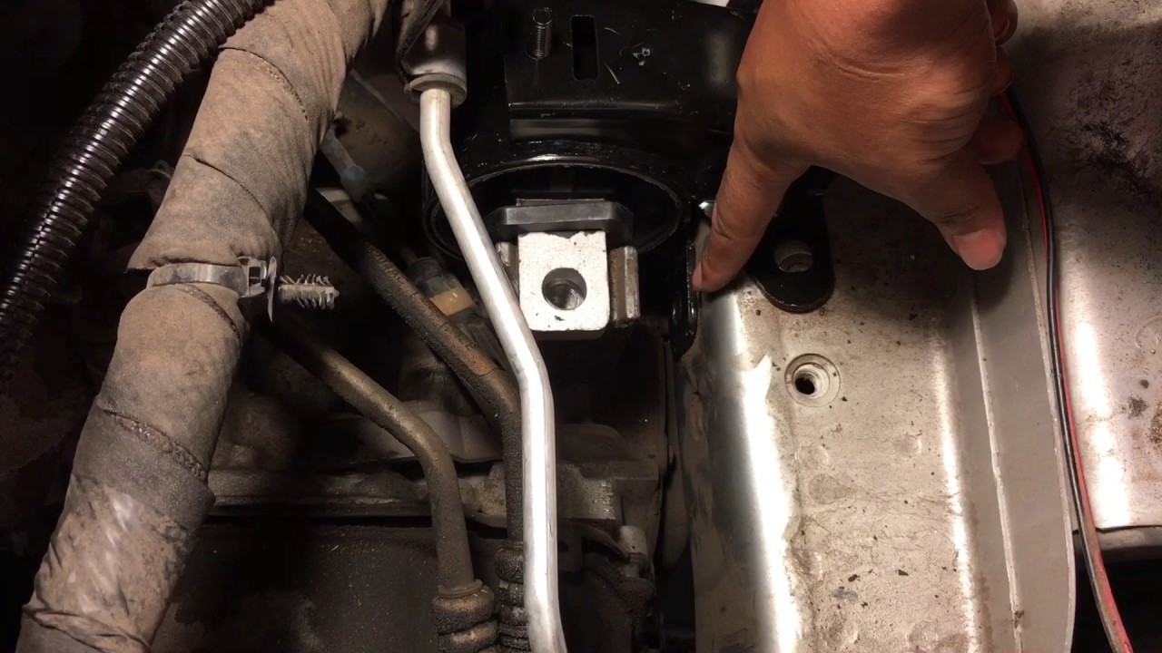 2012 Chrysler Town and Country left engine mount replacement - YouTube