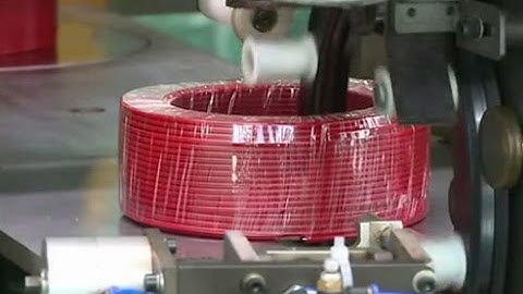 Automatic cable coiling and wrapping packing line