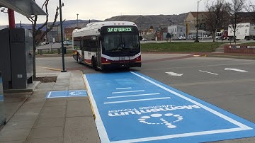 Electric Bus pulls up to wireless charging station
