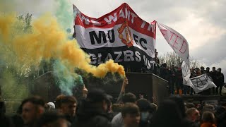 Man United game postponed after fans storm stadium in protest Man United game postponed after fans storm stadium in protest