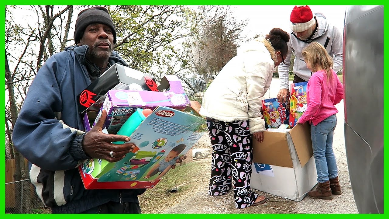handing out toys for christmas youtube