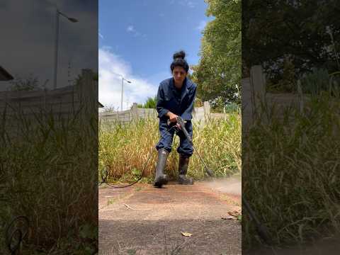 Ready in protective hunter wellies & jumpsuit to jet wash the patio