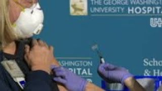 Health workers get first doses of COVID vaccine