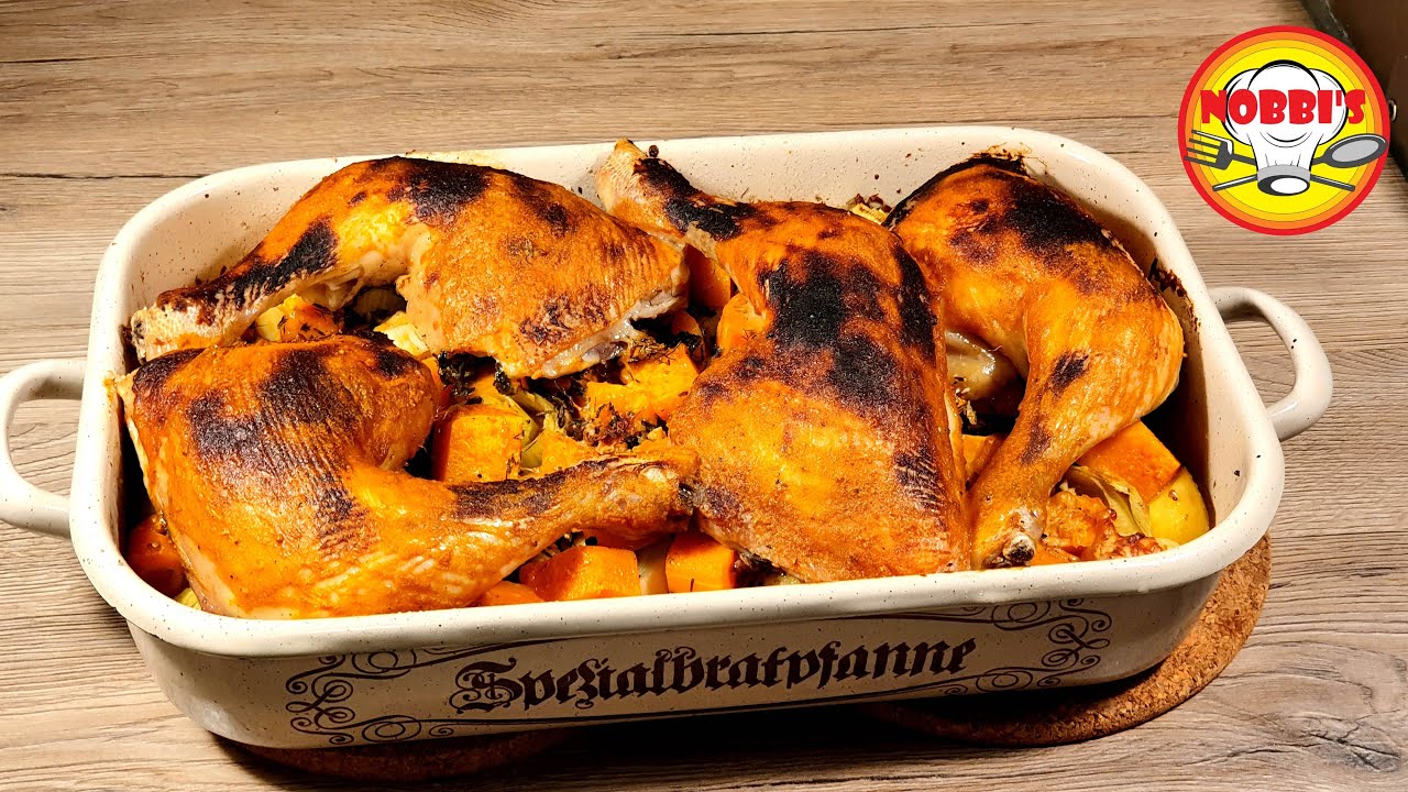 Knusprige Hähnchenschenkel aus dem Ofen mit viel Gemüse