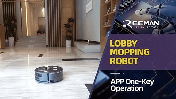 Commercial mopping robot performs cleaning work in the lobby of an office building