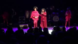 Liz mitchell introducing the present singers