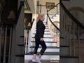 Blonde lady falls down the stairs trying to do a tik tok dance