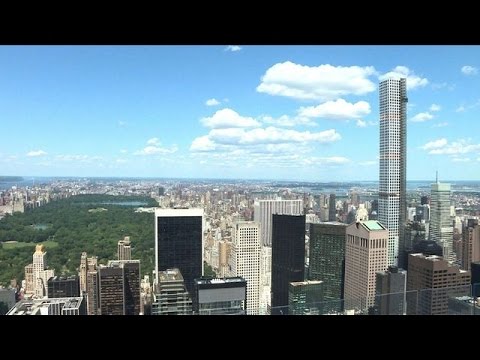 Vidéo: Gratte-ciel Dans Un Quartier Résidentiel