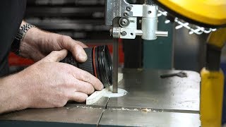 Adam Savage Removes Camera Lens Filter with Band Saw!