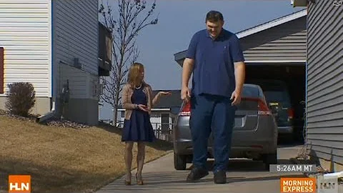 America's tallest man needs big shoes to fill