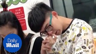 Disgusting Moment Man Uses Womans Finger To Pick His Nose