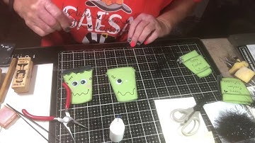 A “Happy Franken’ Halloween” slider card and a Halloween rosette!