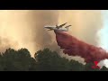 European wildfires stabilise as fourth heatwave looms | 7NEWS