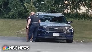 Maryland officer suspended after viral video shows backseat encounter