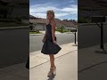 Christina prancing around my neighborhood in a lovely little girly dress and super high heels 