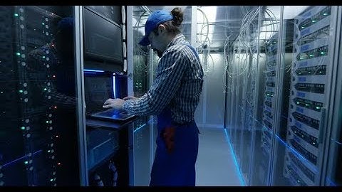 Technician Working at a Data Center | Stock Footage - Videohive