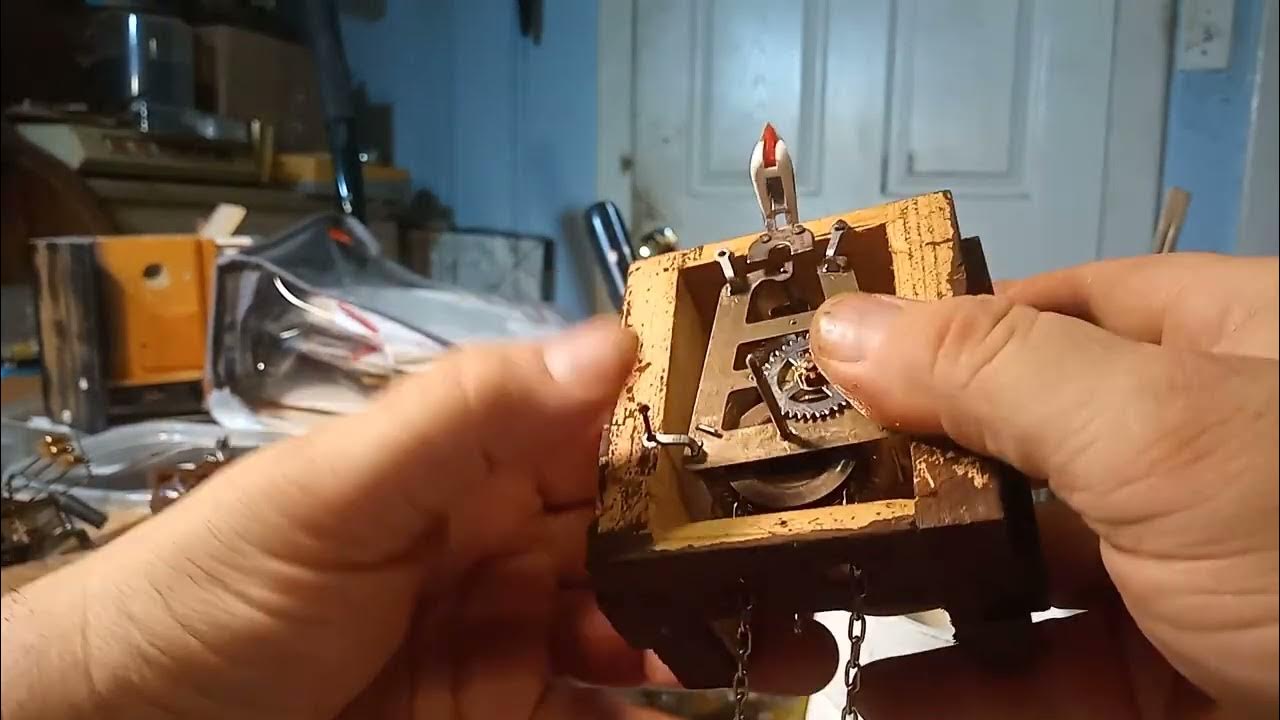 Repairing a quarter hour cuckoo clock that is a After the Hunt, Hunters