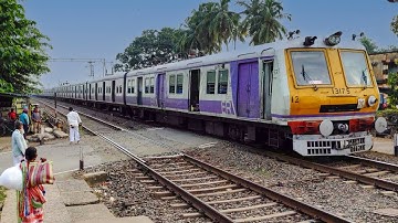 Furious speed of EMU local train through Railgate and station