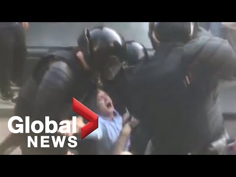 Police beat protesters in Moscow crackdown