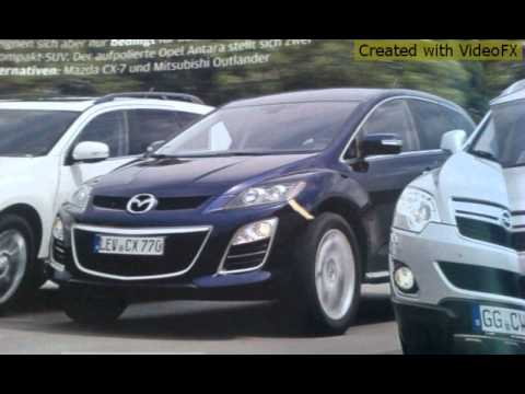 mazda cx-7 или outlander xl