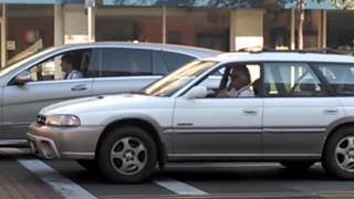 Fluteplaying driver rocks out at traffic light