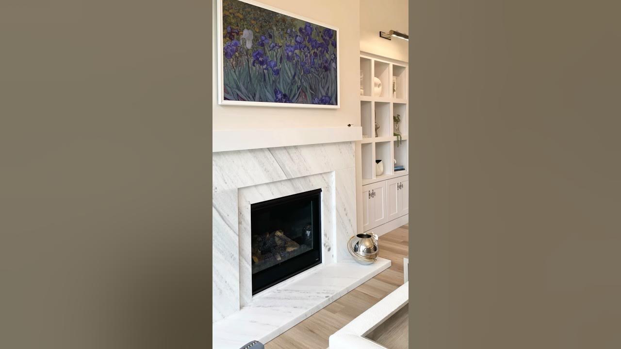 Not just the kitchen! We installed stone for the fireplace surround in