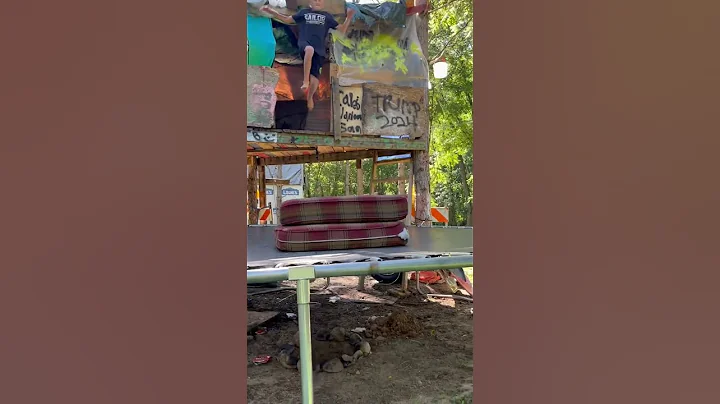 Levi jumping off the treehouse