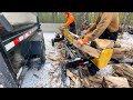 Splitting wood with (2) 25 Ton Countyline log splitters, and custom built quickattach log splitter