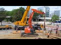 LIEBHERR LTM 1250-5.1 von KNAACK und HITACHI ZAXIS 225 beim Einbau eines Stahlbeton Schachtbauwerk