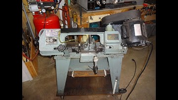 Metal bandsaw blade guide adjustment