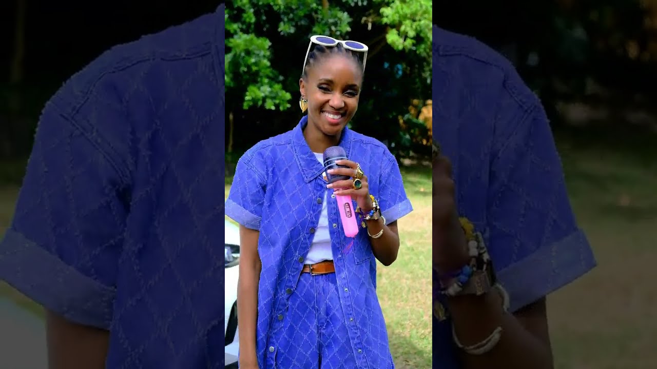 Lunathi Mampofu sits in an interview at Sugar Bay Camp in Zinkwazi Beach, sharing why her daughter Skye loves returning to the KZN North Coast sleepover holiday camp and how the experience has helped her grow in independence.