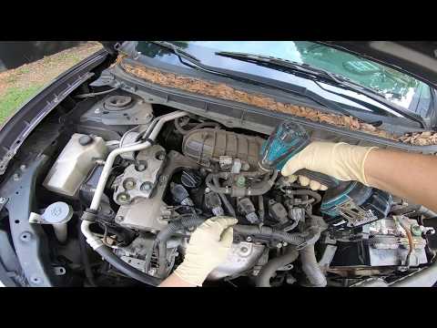 how to remove ignition coils on a Nissan Rouge misfiring P0300 Code
