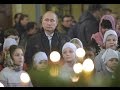 Putin attends Russian Orthodox Christmas Eve Mass