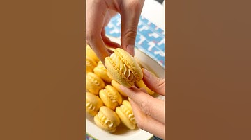 Lemon Macarons and this time I pipe in the circles. #lemon #macarons