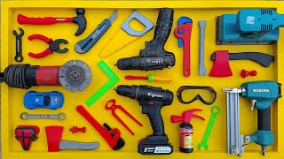 Collection of Repair Tools, Electric Drill, Electric Saw, Hammer With Wriench, Pliers, Hacksaw