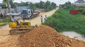 WONDERFUL START PROJECT Landfill Crossing Canal by Skill bulldozer pushing with Dump truck Transport