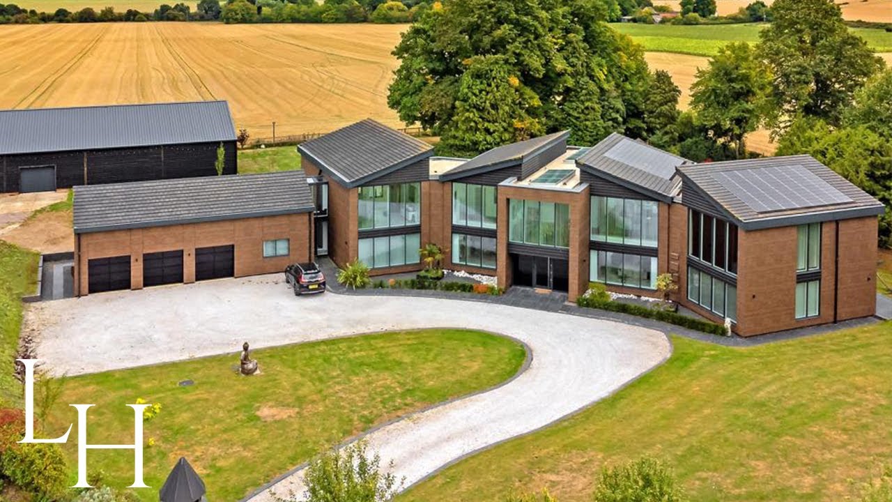 ⁣Inside an Ultra Modern £4,000,000 Sustainable Home with the Ultimate Garage!